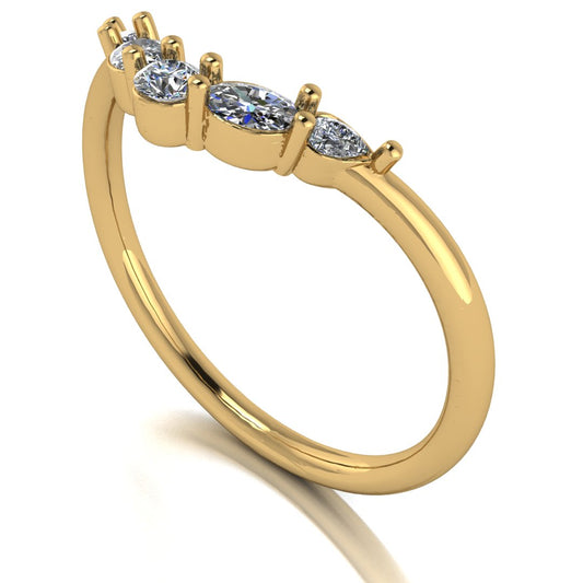 angled view of a yellow gold eternity ring or wedding band shaped with pear, oval & round lab grown diamonds