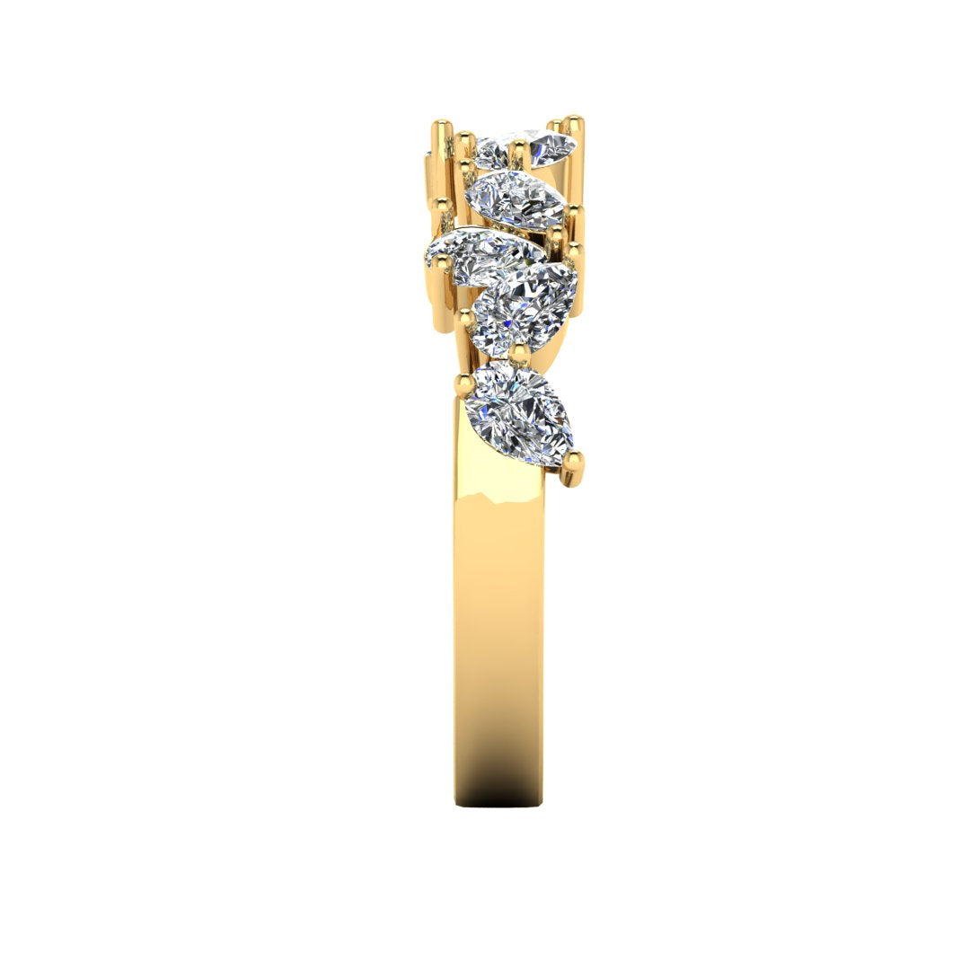 side view off a glamourous intricate yellow gold eternity ring which can also be worn as a wedding band featuring pear cut lab-grown diamonds arranged in a pattern