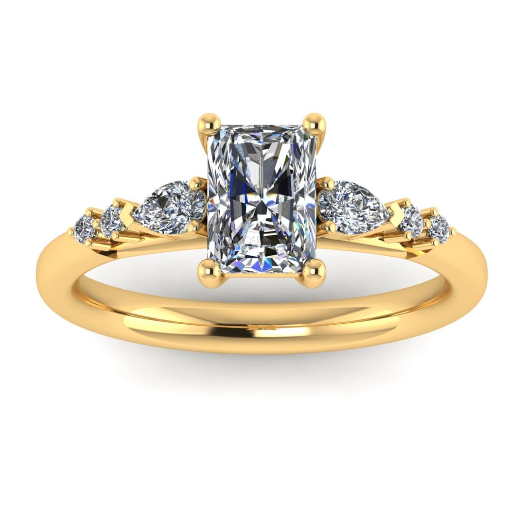 front view of a yellow gold multi-stone lab grown diamond engagement ring. It features a radiant cut lab-grown diamond with one pear and two round side diamonds on either side
