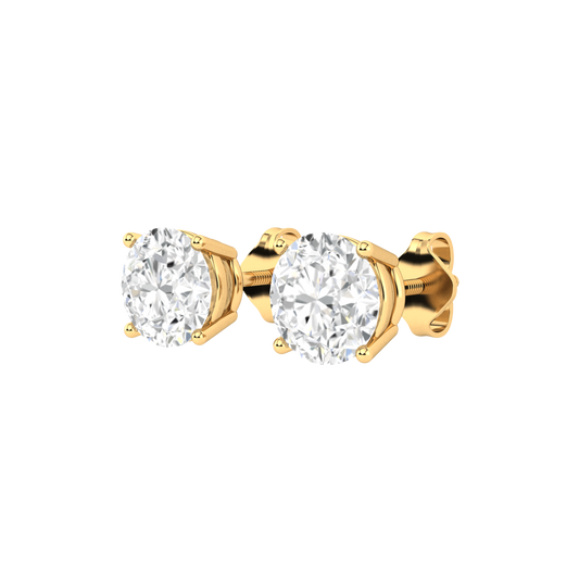 Angled profile of a pair of yellow gold solitaire stud earrings with round brilliant diamonds in a 4 claw prong basket setting