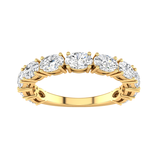 Front view of a yellow gold half set eternity ring with horizontally set oval shaped lab grown diamonds