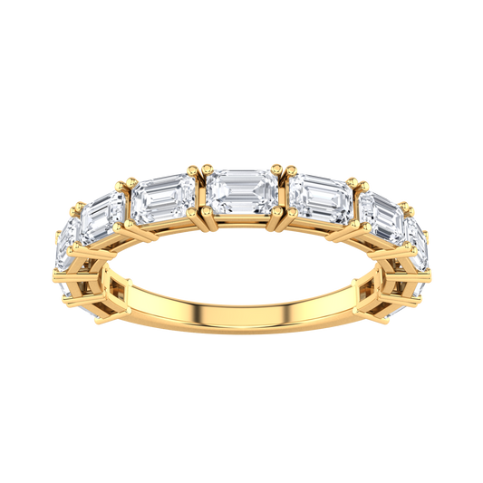 Front view of a yellow gold half set eternity ring with emerald cut lab grown diamonds set horizontally