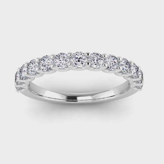 video view of a platinum or white gold wedding band or half eternity ring which is scallop set with round brilliant lab-grown diamond