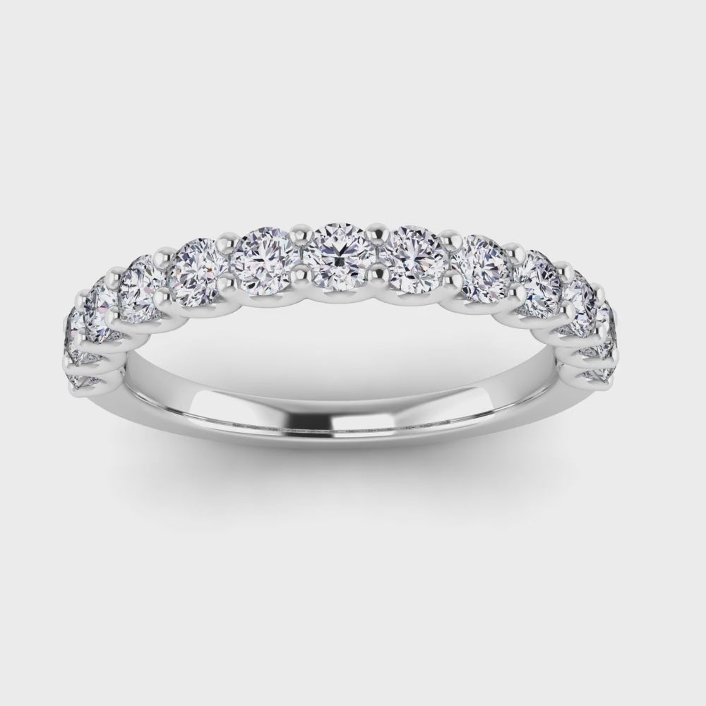 video view of a platinum or white gold wedding band or half eternity ring which is scallop set with round brilliant lab-grown diamond