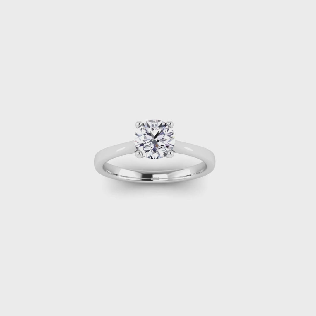 video showing a 60 view of the Arya Engagement ring. Lab grown round brilliant diamond in a single solitaire traditional cathedral setting 