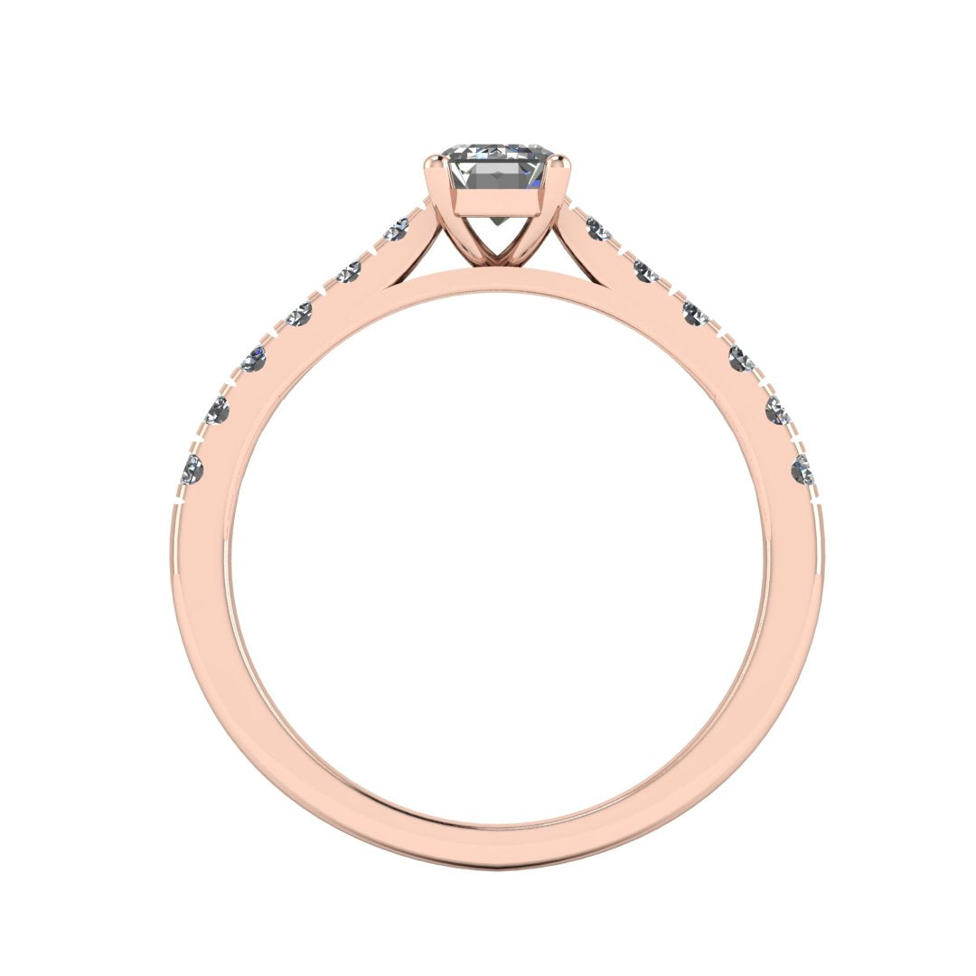 flat view of a rose gold engagement ring with an emerald cut lab-grown diamond as the centre stone with pavé-set diamond shoulders