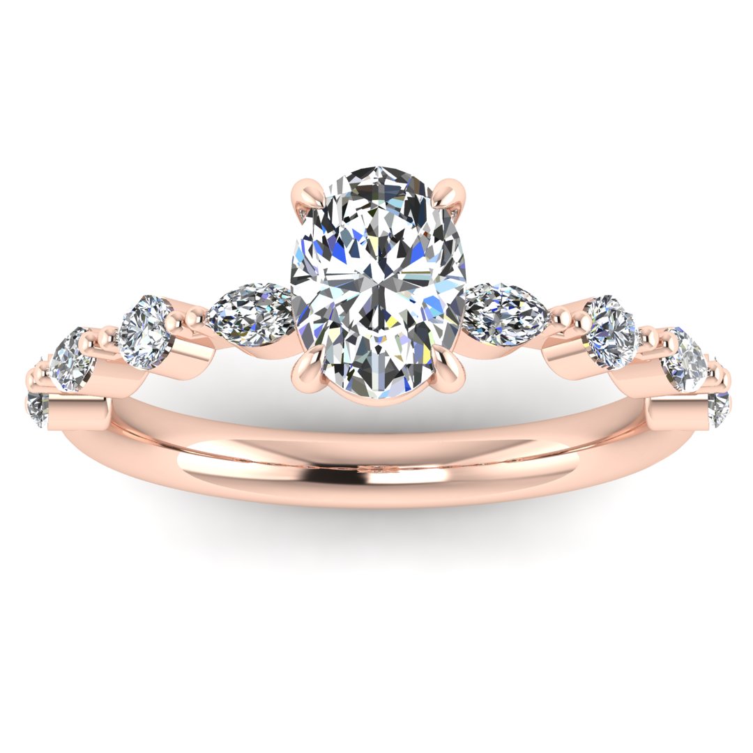 front view of rose gold of Lily engagement ring with an oval cut centre stone surrounded by alternating smaller round and marquise stones on the shoulder