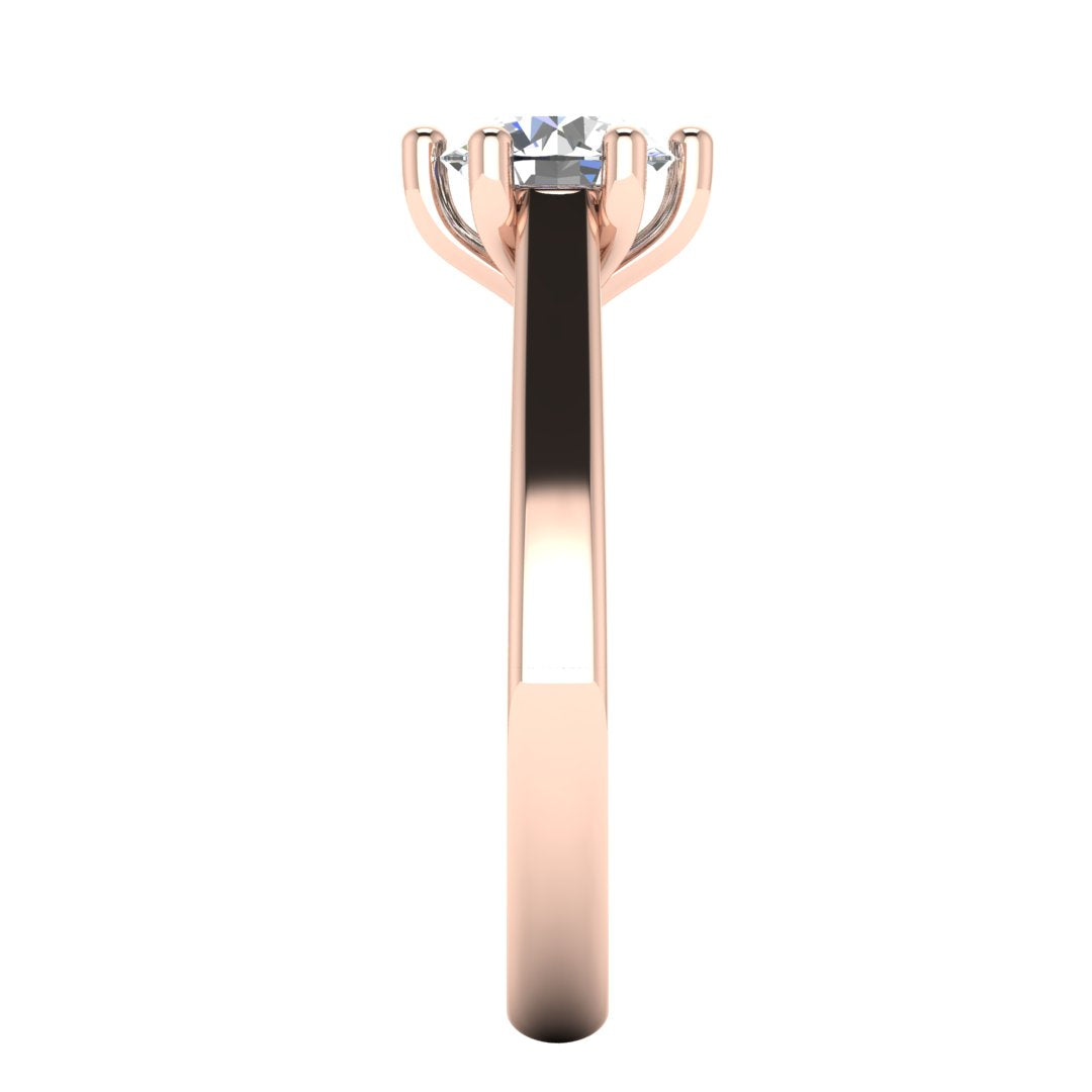 Side view of Chelsea lab grown round brilliant engagement 6 claw ring in cathedral setting in rose gold