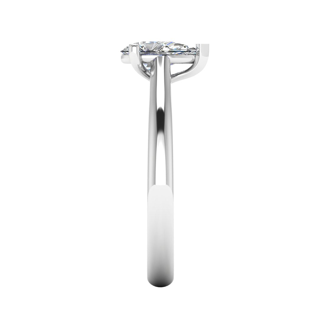 side view of platinum or white gold engagement ring with a pear cut lab grown diamond which is ethical and sustainable