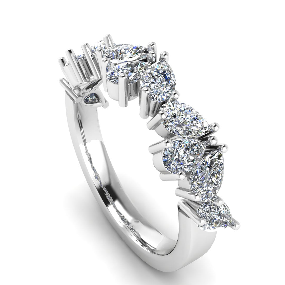 angled view off a glamourous intricate platinum or white gold eternity ring which can also be worn as a wedding band featuring pear cut lab-grown diamonds arranged in a pattern