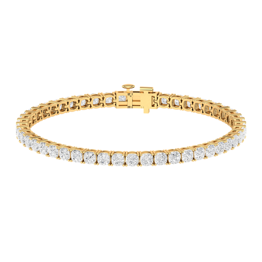 yellow gold tennis line bracelet with cushion cut shaped ethical & sustainable lab grown diamonds set using prongs