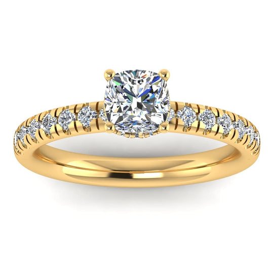 front view of a yellow gold cushion cut lab grown diamond engagement ring with pavé shoulders and a hidden halo