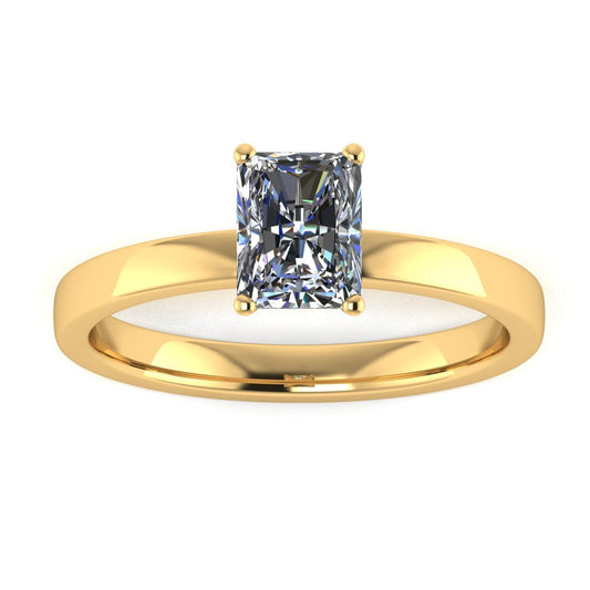front view of yellow gold engagement ring with an emerald cut lab grown diamond as the centre stone in a floating setting