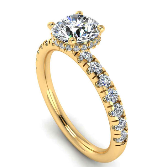 Angled view in yellow  gold of Emma lab grown engagement ring with round brilliant, side shoulders and under halo