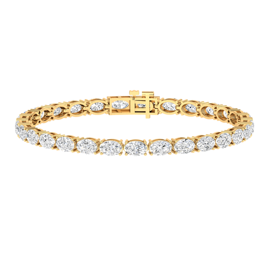 yellow gold tennis line bracelet with oval cut ethical & sustainable lab grown diamonds set horizontally using prongs