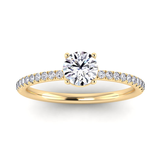 Front view of Isabella engagement in yellow gold with a round brilliant diamond in a floating setting with pavé-set side shoulder