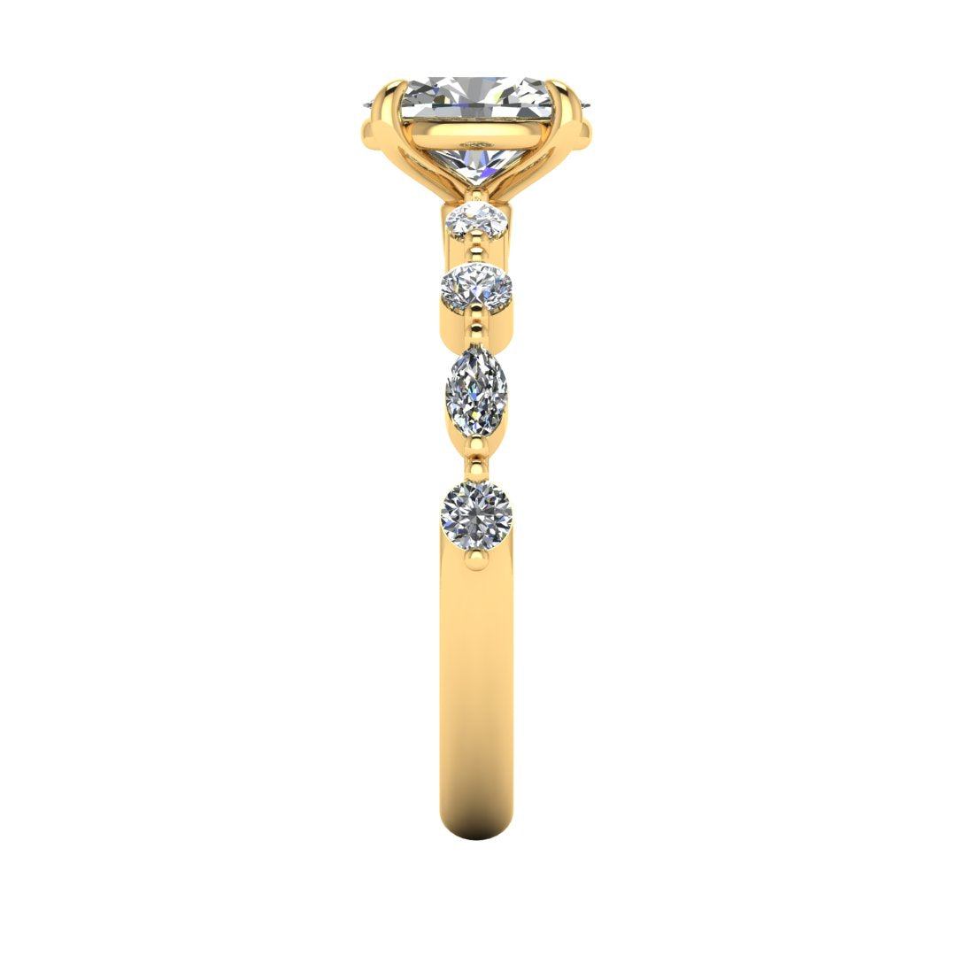 Side view of yellow gold of Lily engagement ring with an oval cut centre stone surrounded by alternating smaller round and marquise stones on the shoulder