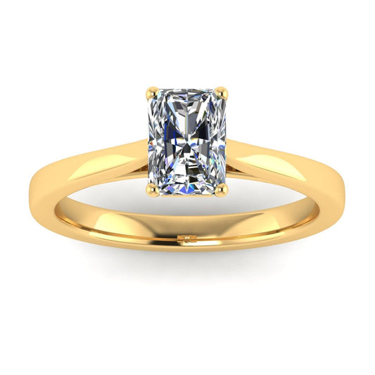 front view of a yellow gold engagement ring set with a radiant cut lab grown diamond with 4 claws