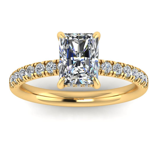 front view of yellow gold engagement ring featuring a radiant cut lab-grown diamond with pavé-set shoulders and a hidden halo