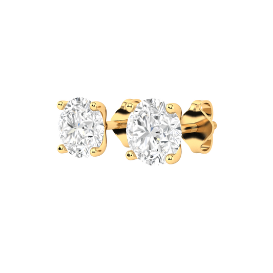 Angled view of yellow gold stud earrings with round brilliant lab grown diamonds in a martini setting