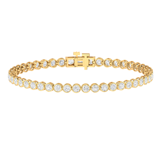 yellow gold line tennis bracelet with ethical round brilliant lab made diamonds in a rubover bezel setting